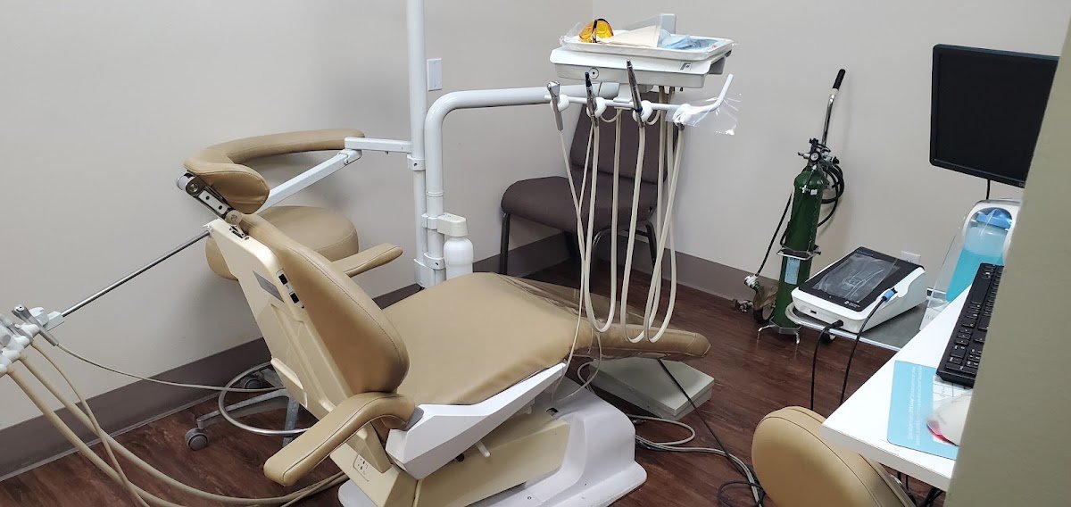 Dental treatment room with patient chair and delivery unit